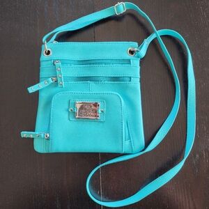 Gorgeous NWOT Nicole Miller Aqua Crossbody Bag Adjustable Strap Lots of Pockets